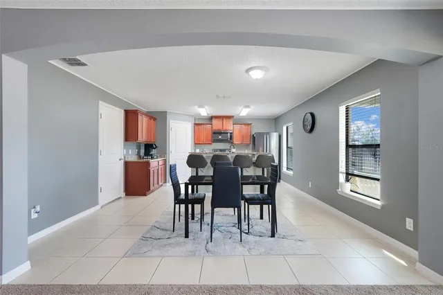 a view of a dining room with furniture