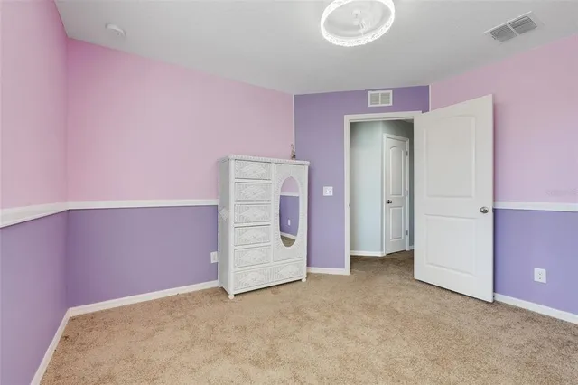 a bathroom with a double vanity sink mirror and