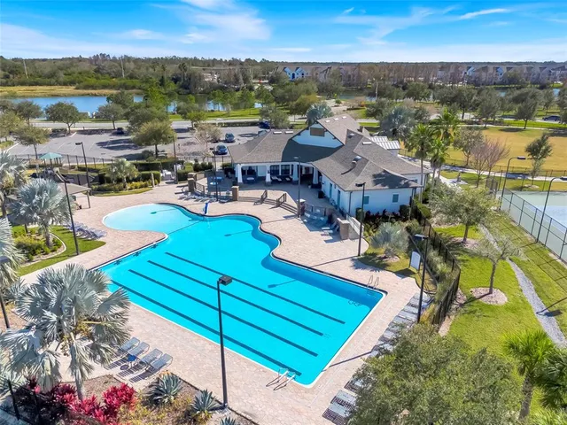 a view of a chairs and table in the patio