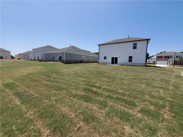 a house view with a outdoor space