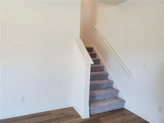 a view of entryway with wooden floor