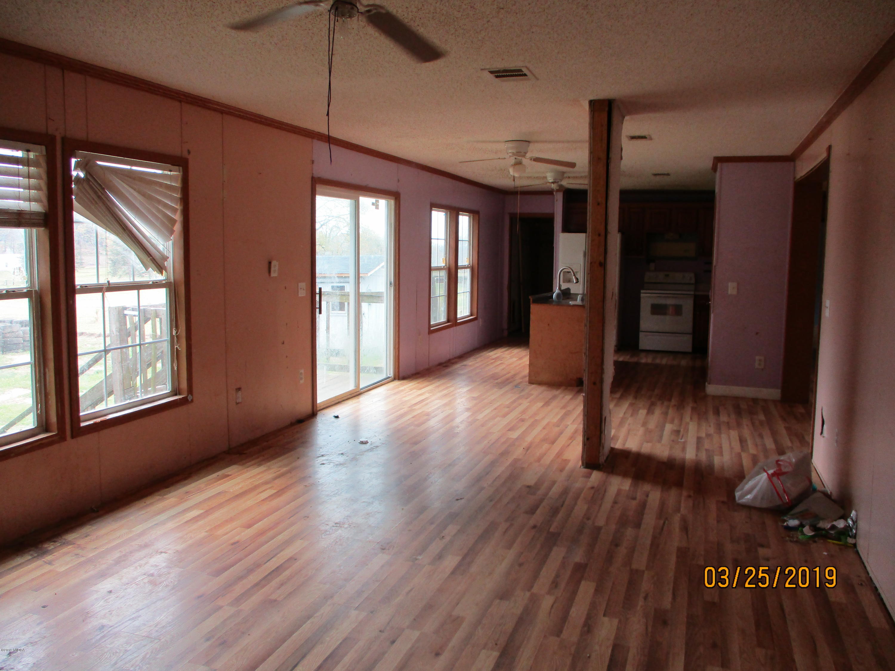 129 Cauley Road Macon, GA 31217 - Photo 11 of 15 Family Room to Kitchen