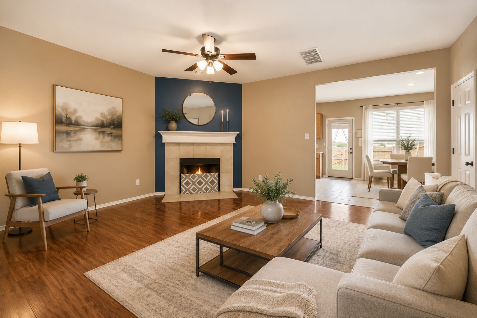 46 Verde Ranch Loop Leander, TX 78641 - Photo 3 of 19 A welcoming living area with fireplace and abundant natural light, flowing into a dining space.