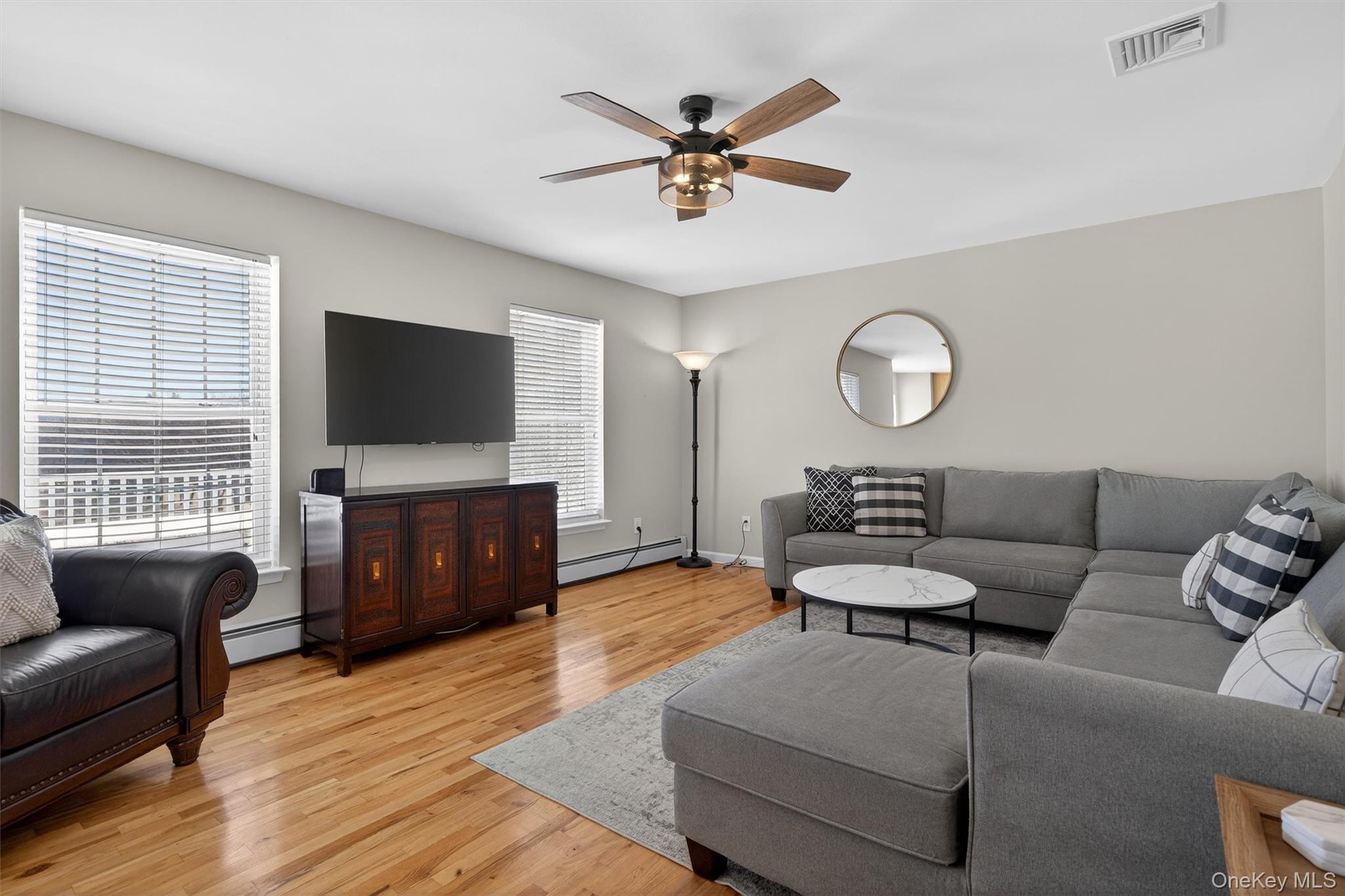 127 Egbertson Road Campbell Hall, NY 10916 - Photo 14 of 48 a living room with furniture and a flat screen tv