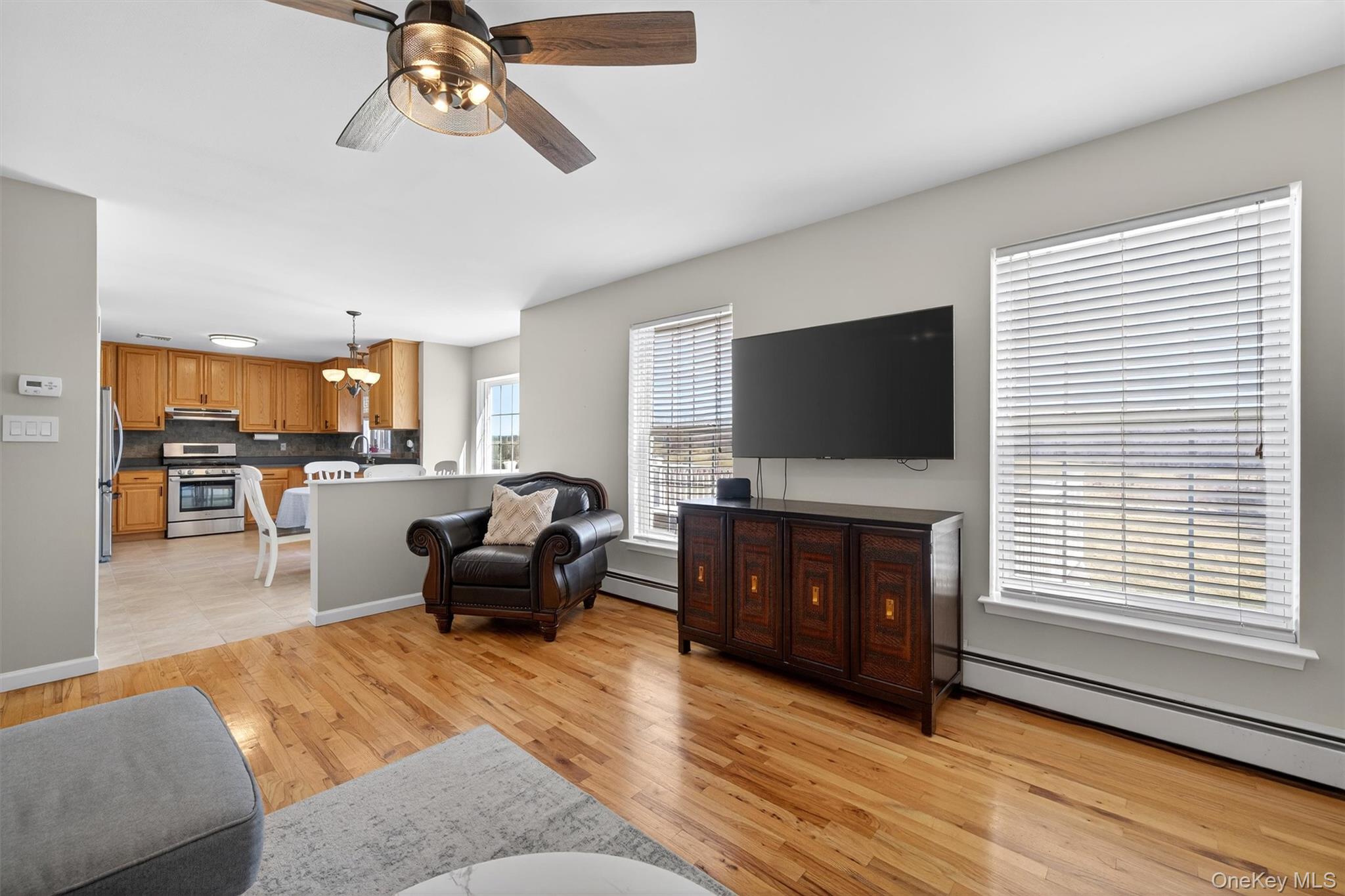 127 Egbertson Road Campbell Hall, NY 10916 - Photo 15 of 48 a living room with furniture and a flat screen tv