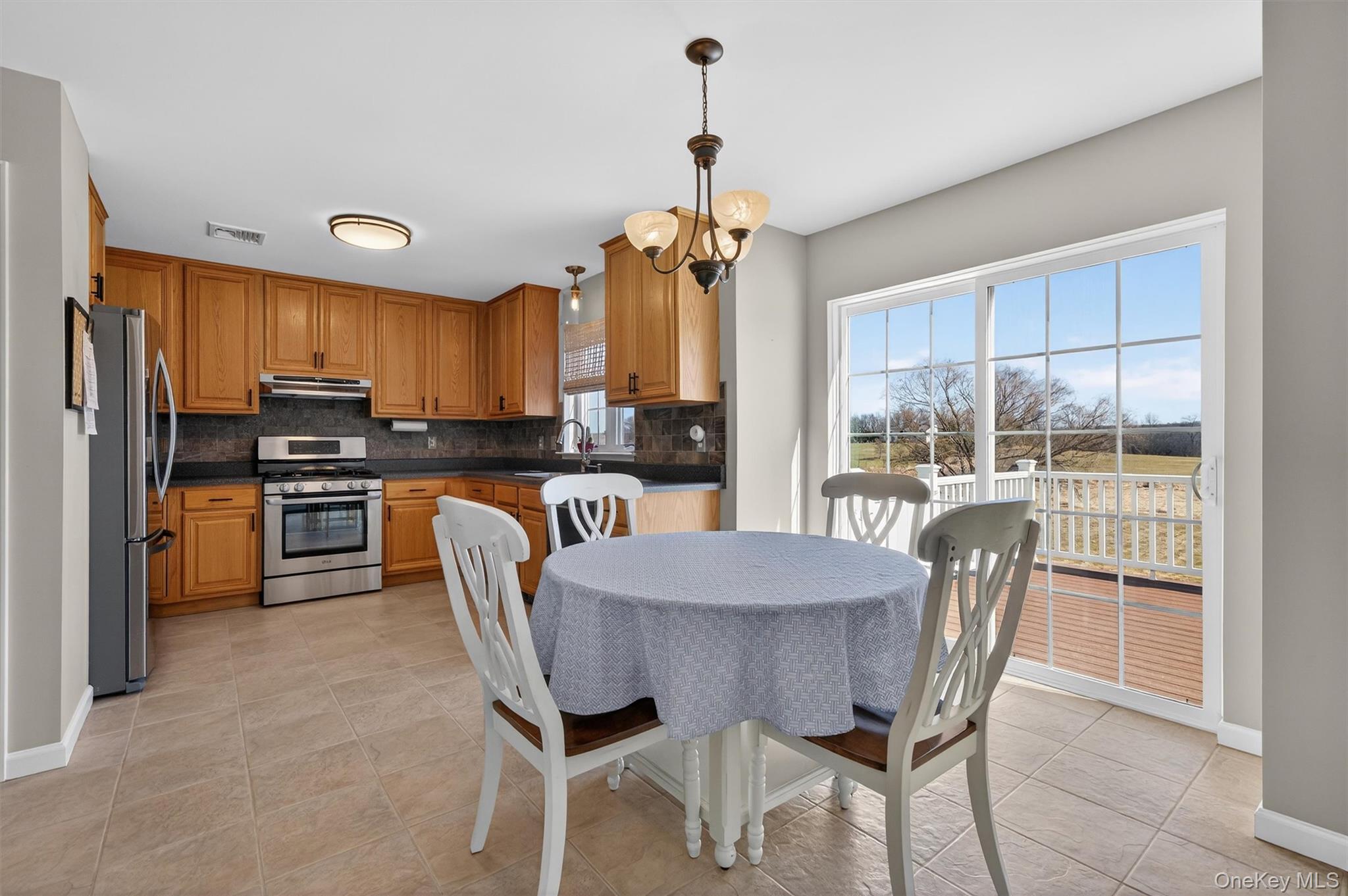 127 Egbertson Road Campbell Hall, NY 10916 - Photo 17 of 48 a view of a dining room with furniture window and outside view