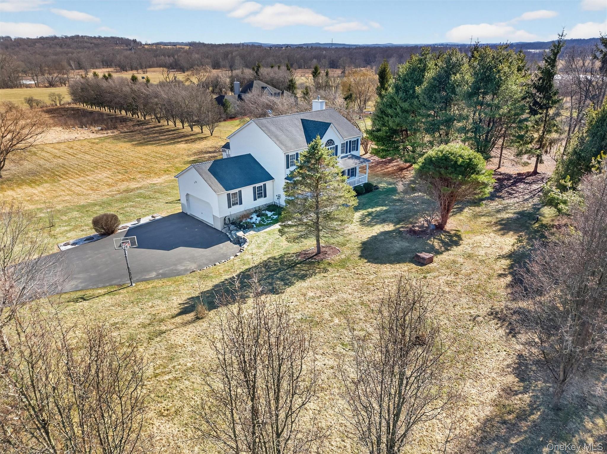 127 Egbertson Road Campbell Hall, NY 10916 - Photo 2 of 48 a view of a lake in middle of the town