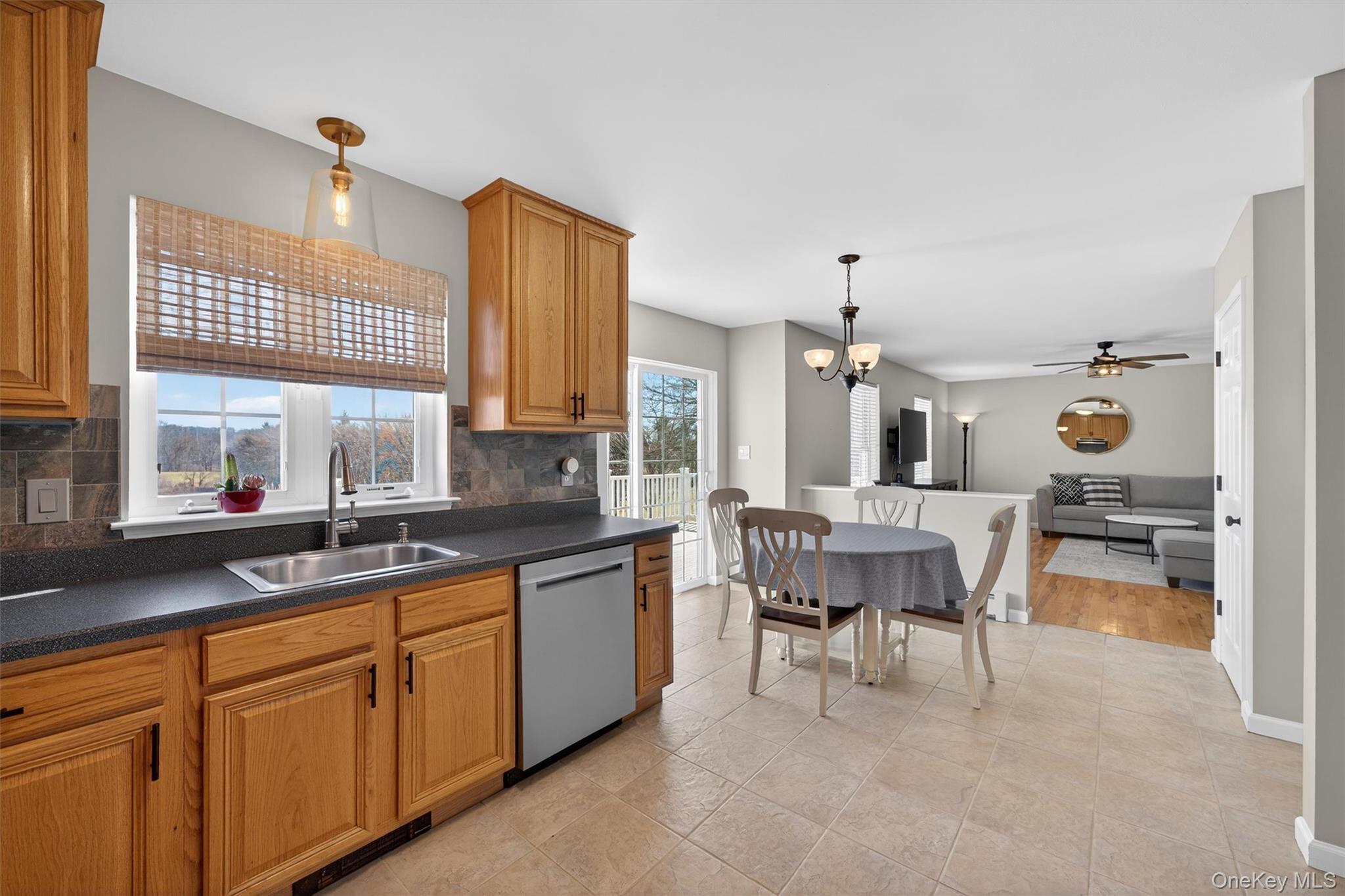 127 Egbertson Road Campbell Hall, NY 10916 - Photo 22 of 48 a kitchen with a sink and cabinets
