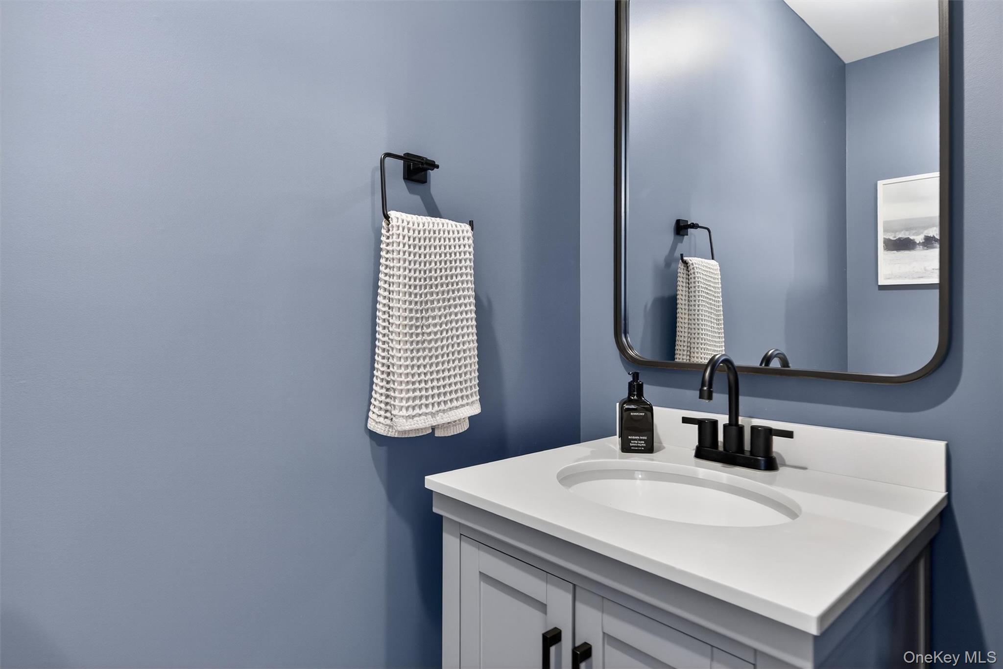 127 Egbertson Road Campbell Hall, NY 10916 - Photo 23 of 48 a bathroom with a sink and a mirror