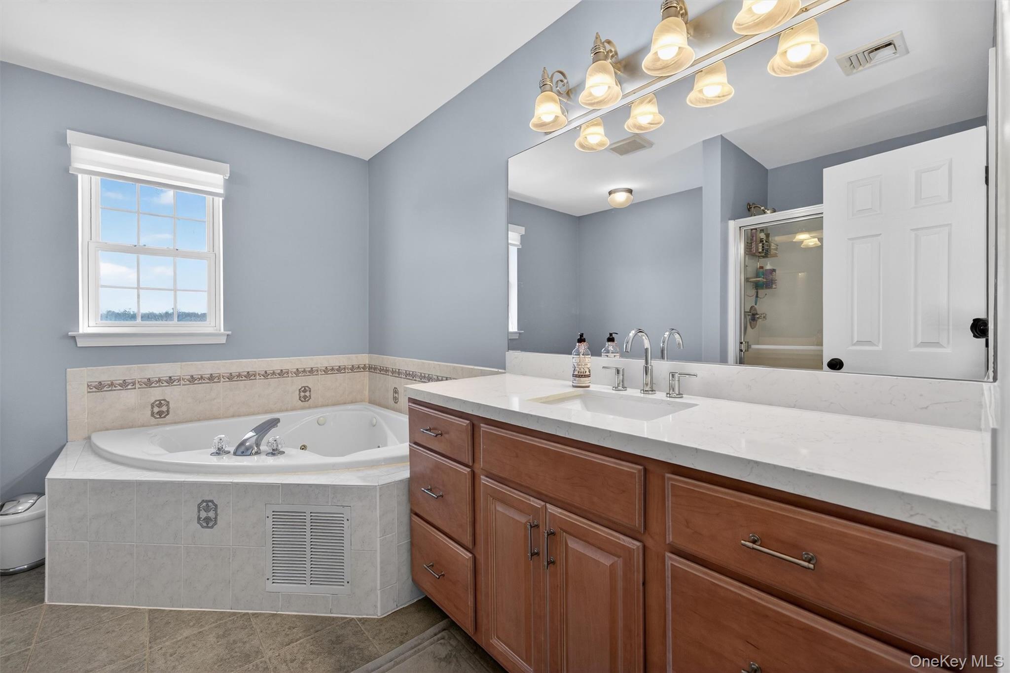 127 Egbertson Road Campbell Hall, NY 10916 - Photo 28 of 48 a bathroom with a sink double vanity and a mirror