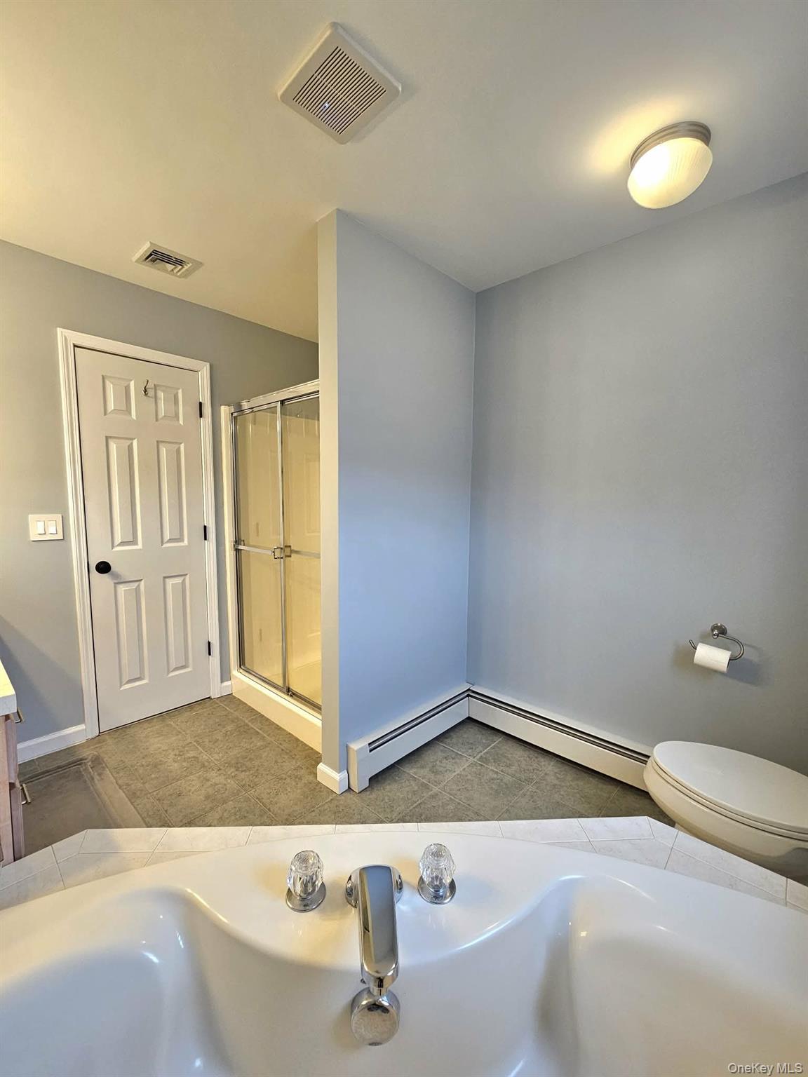 127 Egbertson Road Campbell Hall, NY 10916 - Photo 29 of 48 a bathroom with a bathtub and a sink