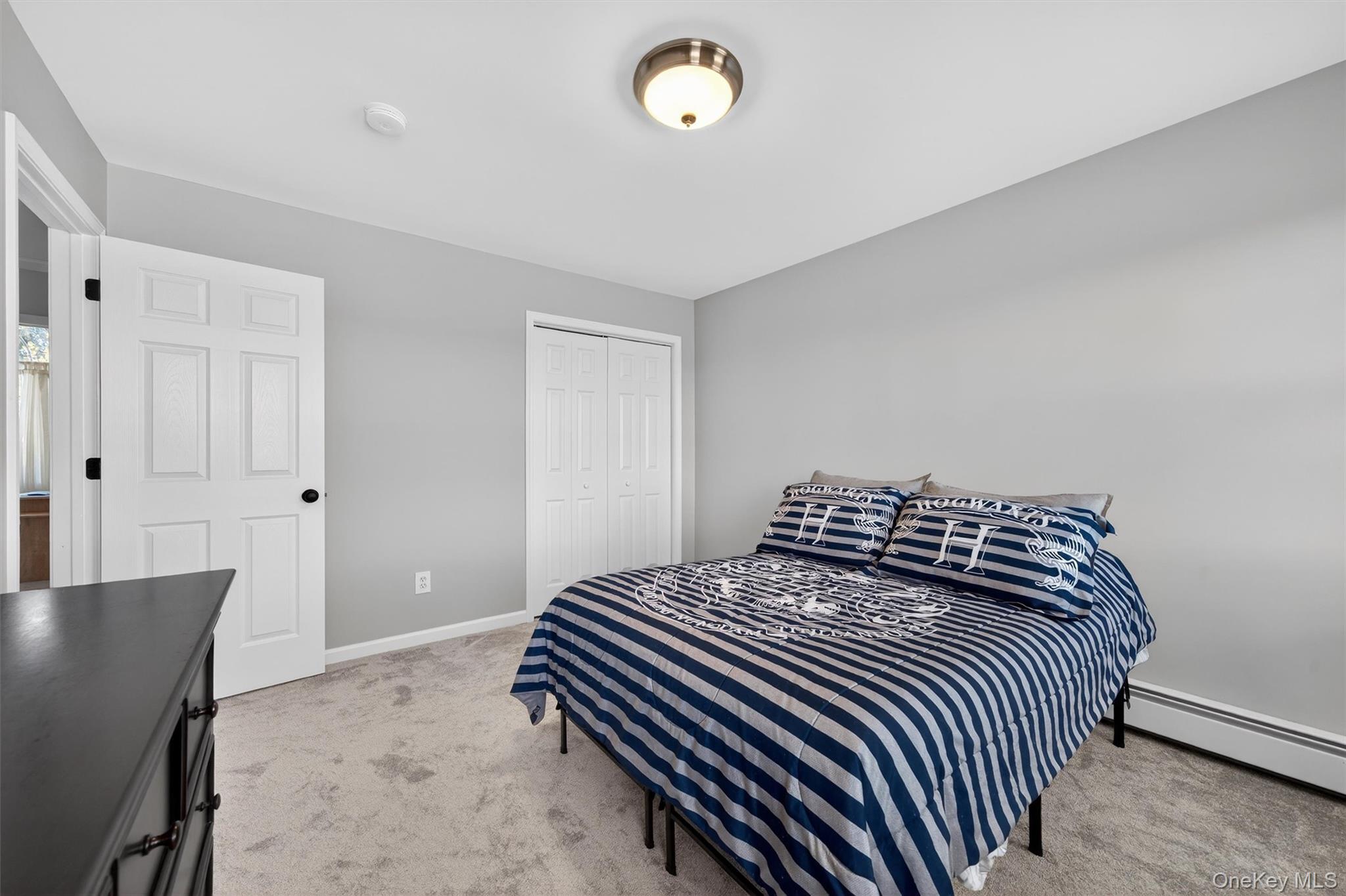 127 Egbertson Road Campbell Hall, NY 10916 - Photo 33 of 48 a bedroom with a bed and a window
