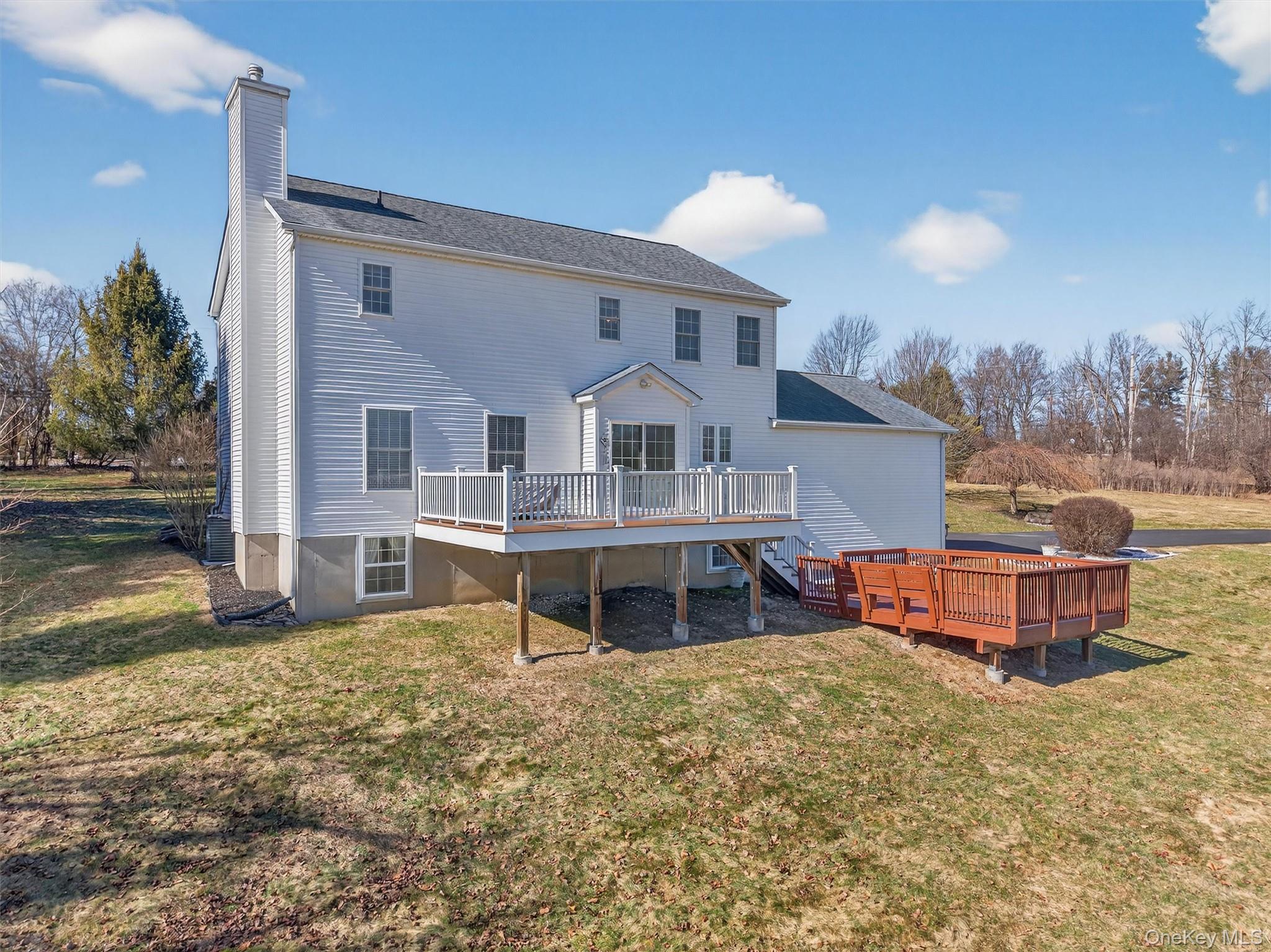 127 Egbertson Road Campbell Hall, NY 10916 - Photo 37 of 48 a front view of a house with a yard and balcony