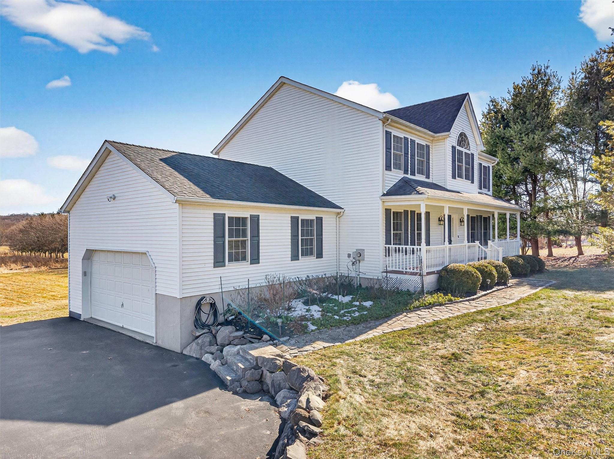 127 Egbertson Road Campbell Hall, NY 10916 - Photo 6 of 48 a front view of a house with a yard