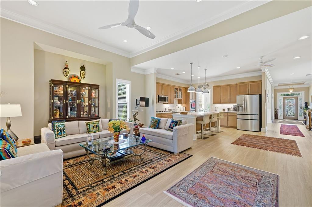608 Red Leaf Way Canton, GA 30114 - Photo 16 of 43 a living room with furniture kitchen view and a table