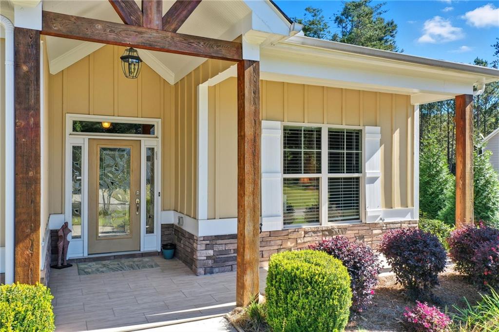 608 Red Leaf Way Canton, GA 30114 - Photo 4 of 43 a front view of a house with garden