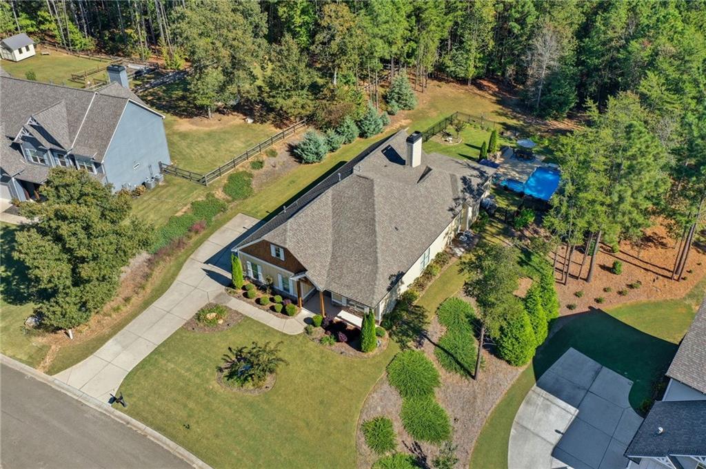 608 Red Leaf Way Canton, GA 30114 - Photo 9 of 43 an aerial view of a house a yard and mountain view