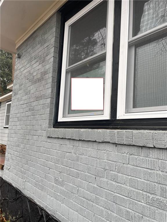 1827 Ridgeland Drive Decatur, GA 30032 - Photo 2 of 6 a view of a window of a house