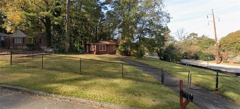 1827 Ridgeland Drive Decatur, GA 30032 - Photo 4 of 6 a view of a backyard with swimming pool