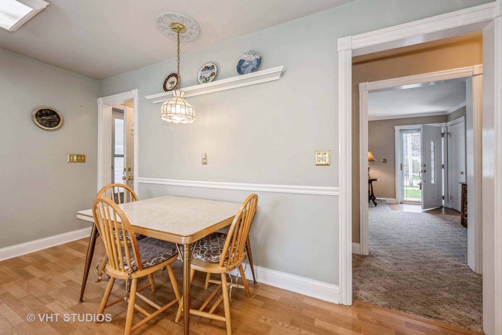309 East Locust Street Batavia, IL 60510 - Photo 6 of 14 a view of a dining room with furniture and wooden floor