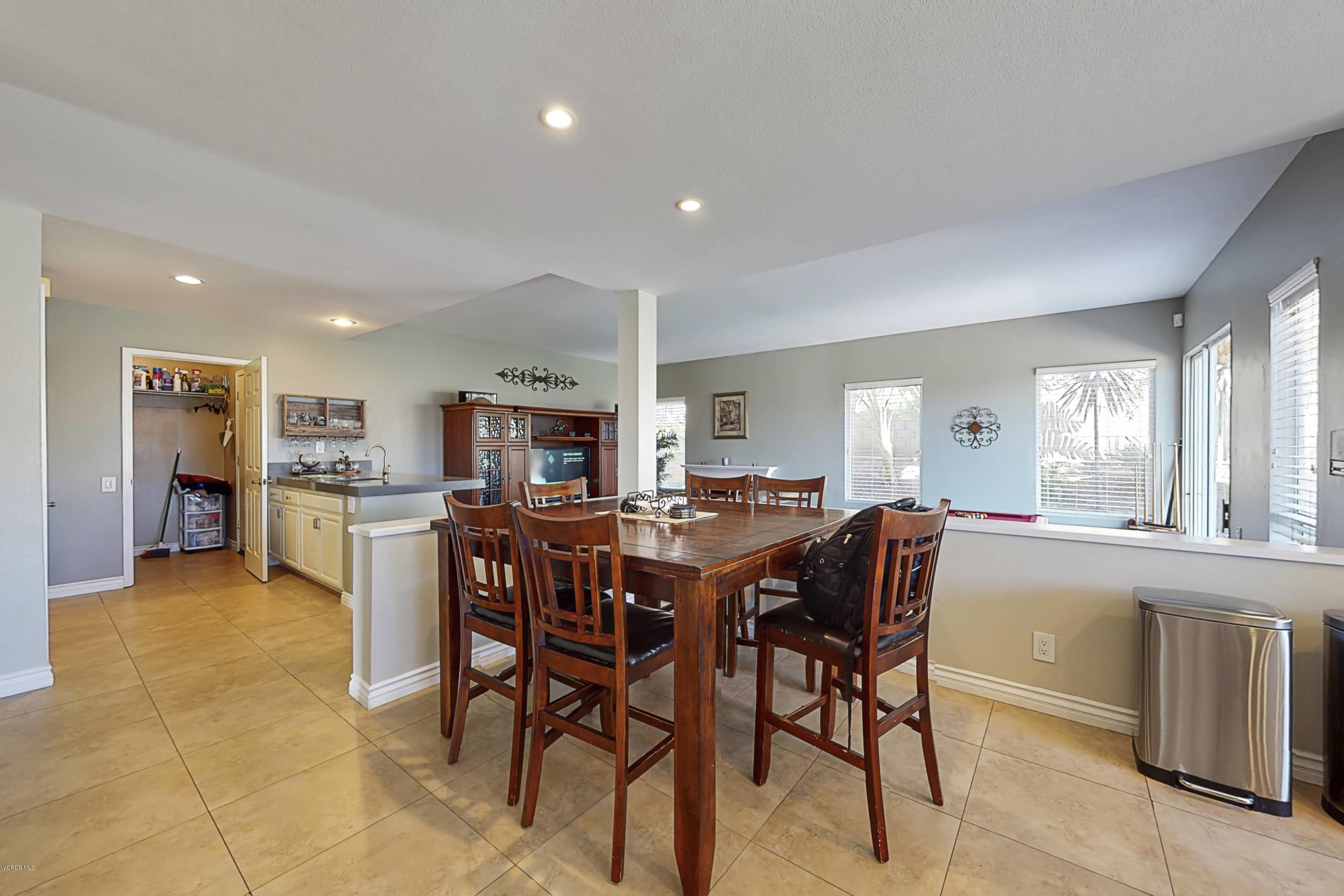 11577 Chestnut Ridge Street Moorpark, CA 93021 - Photo 16 of 58 a view of a dining room kitchen and a window