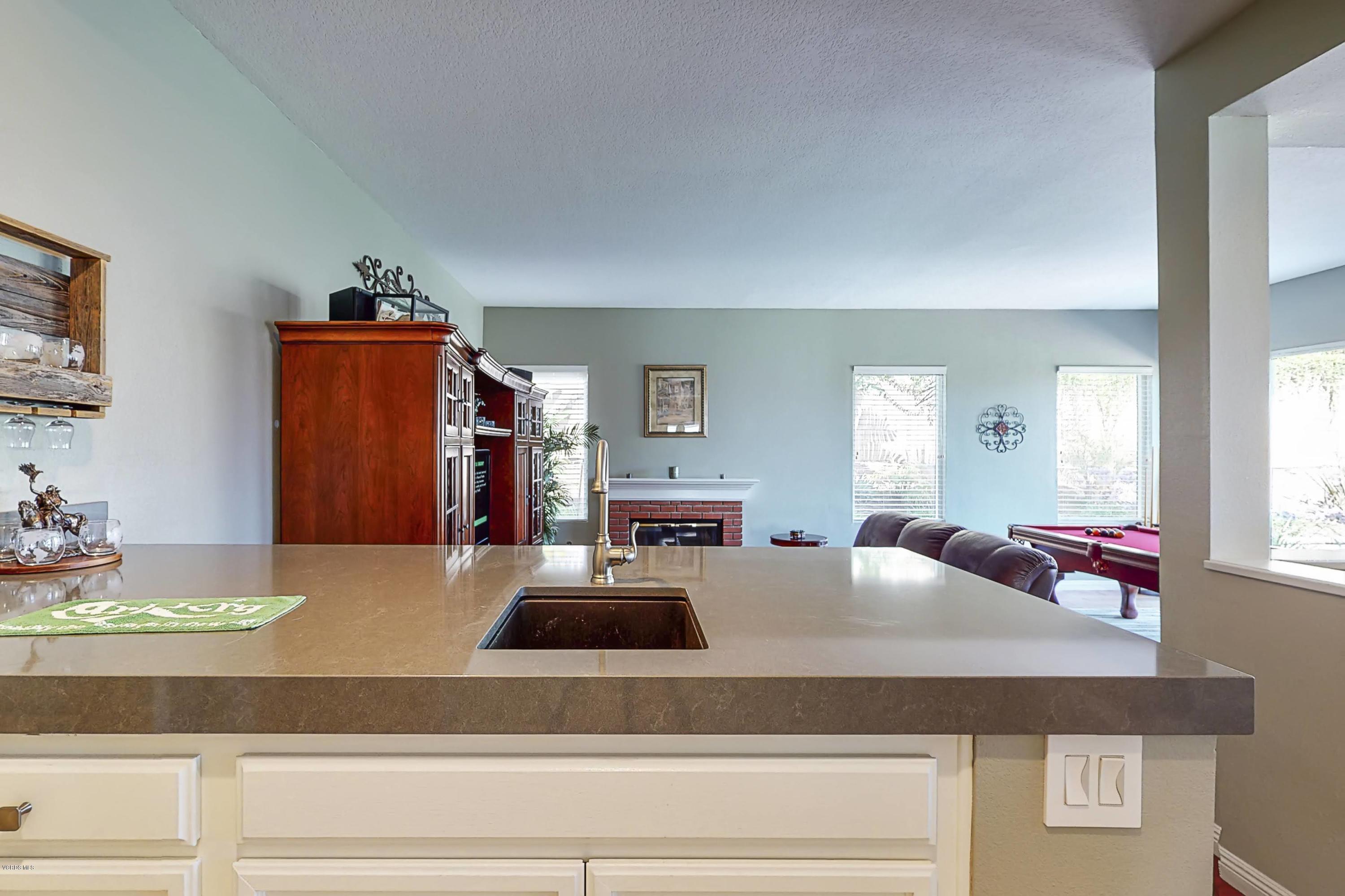 11577 Chestnut Ridge Street Moorpark, CA 93021 - Photo 23 of 58 a living room with furniture and flat screen tv