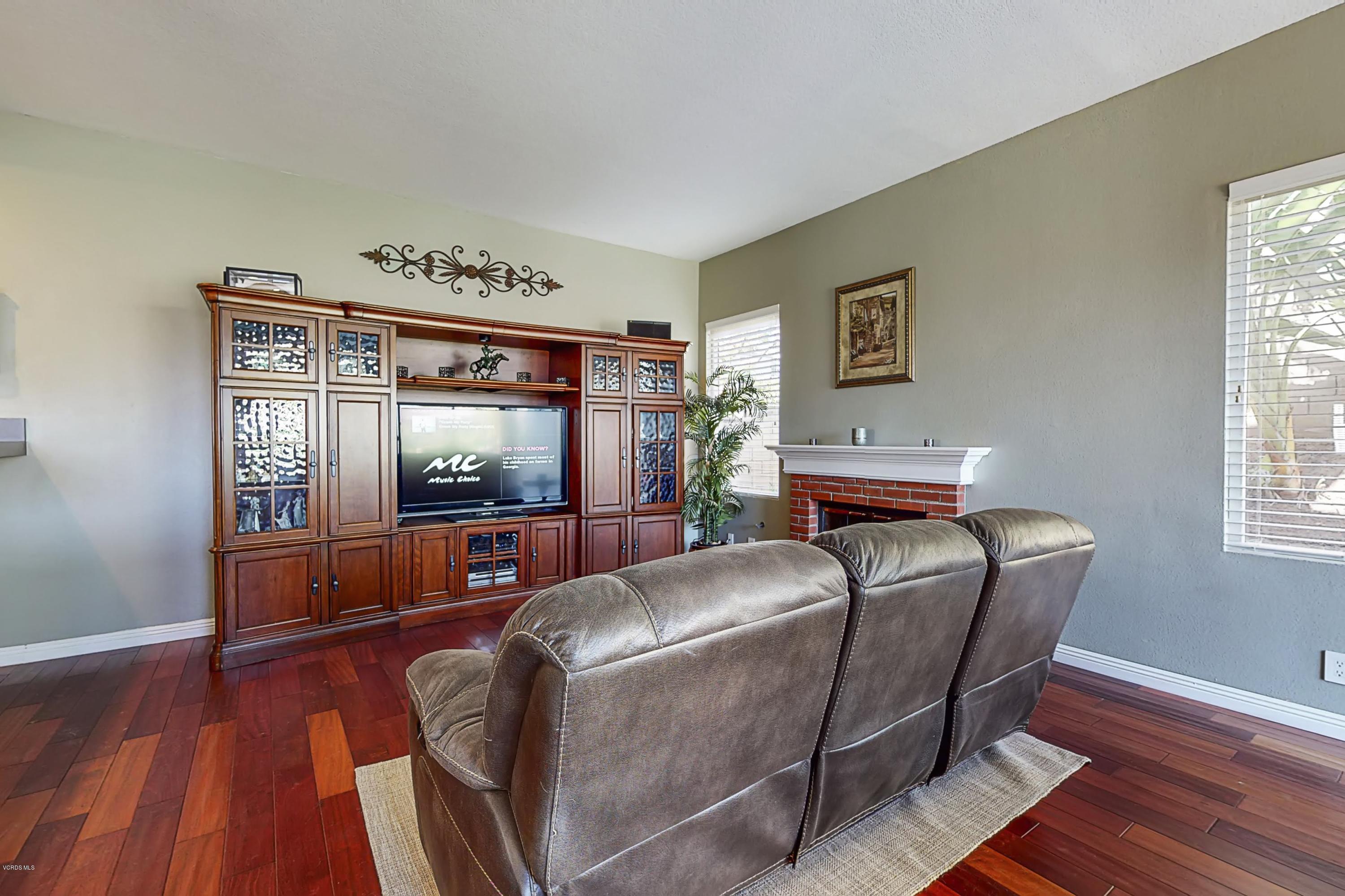 11577 Chestnut Ridge Street Moorpark, CA 93021 - Photo 24 of 58 a living room with furniture and a window