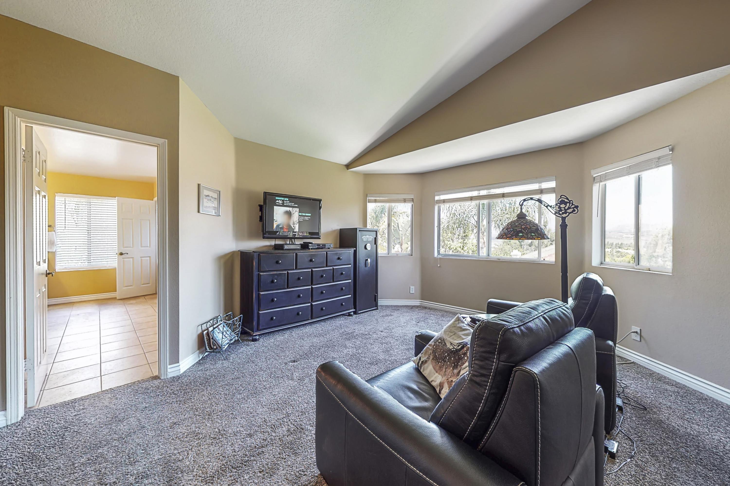 11577 Chestnut Ridge Street Moorpark, CA 93021 - Photo 31 of 58 a living room with furniture and a window