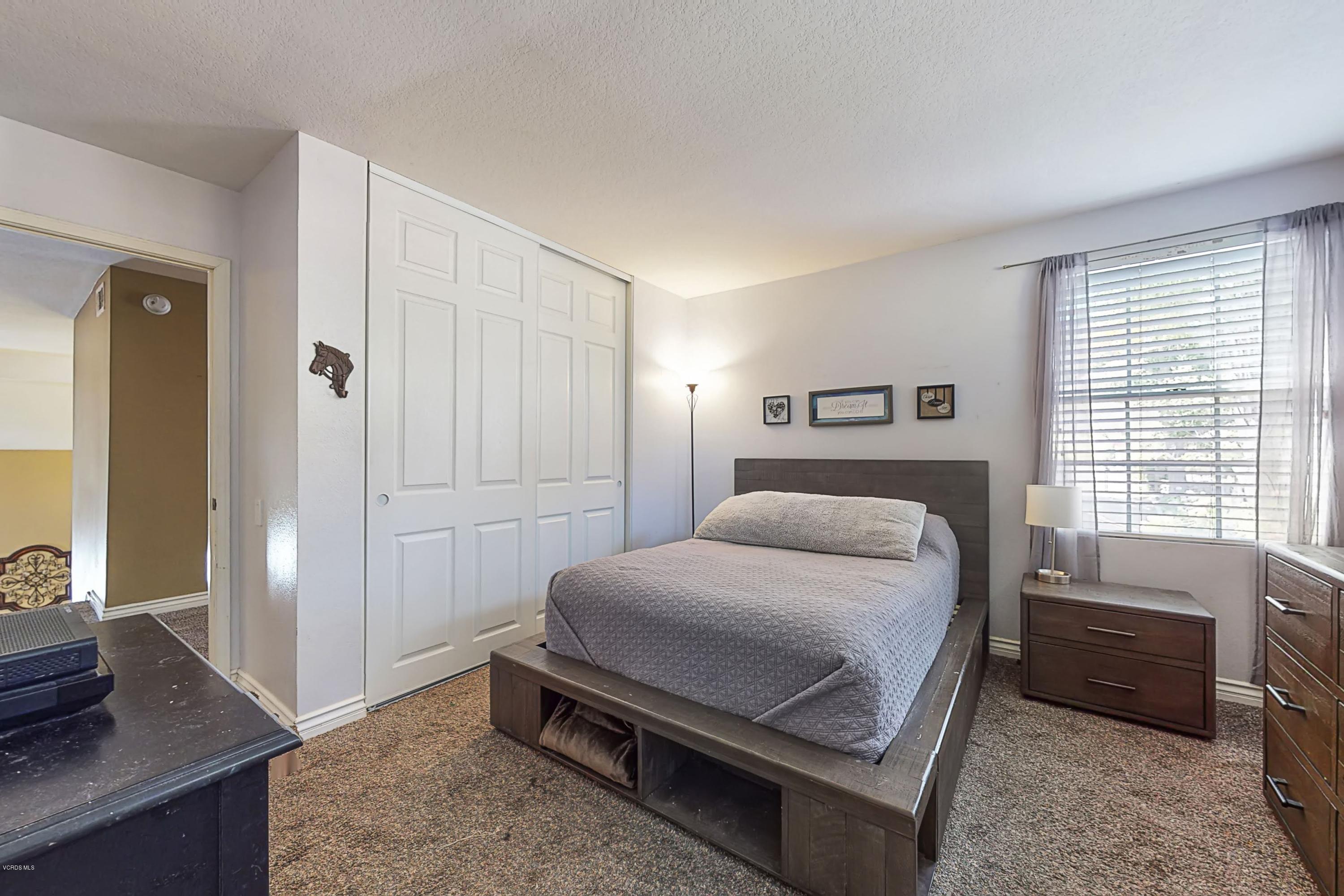 11577 Chestnut Ridge Street Moorpark, CA 93021 - Photo 44 of 58 a bedroom with a bed and a view of bedroom
