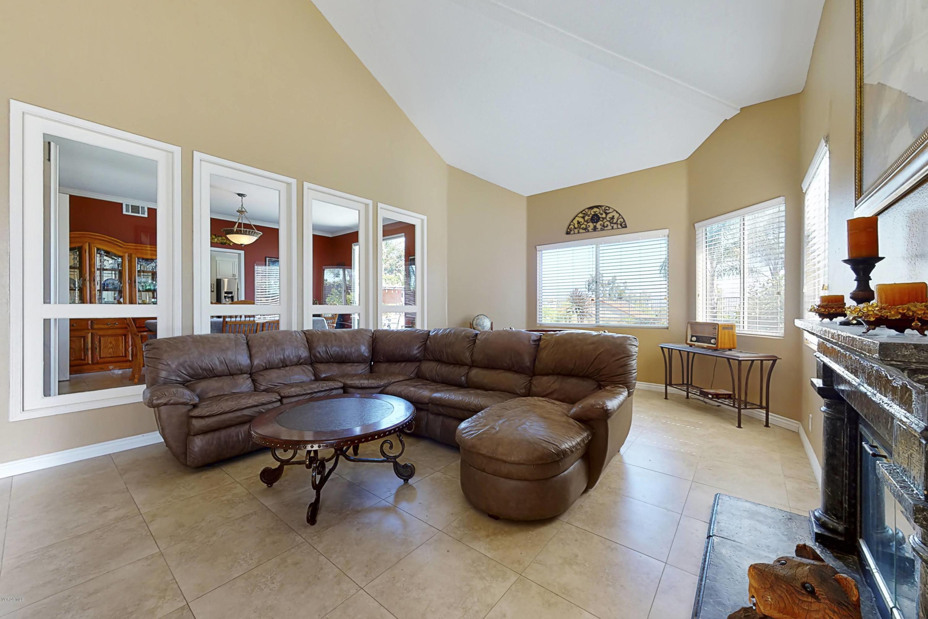 11577 Chestnut Ridge Street Moorpark, CA 93021 - Photo 6 of 58 a living room with furniture and a window
