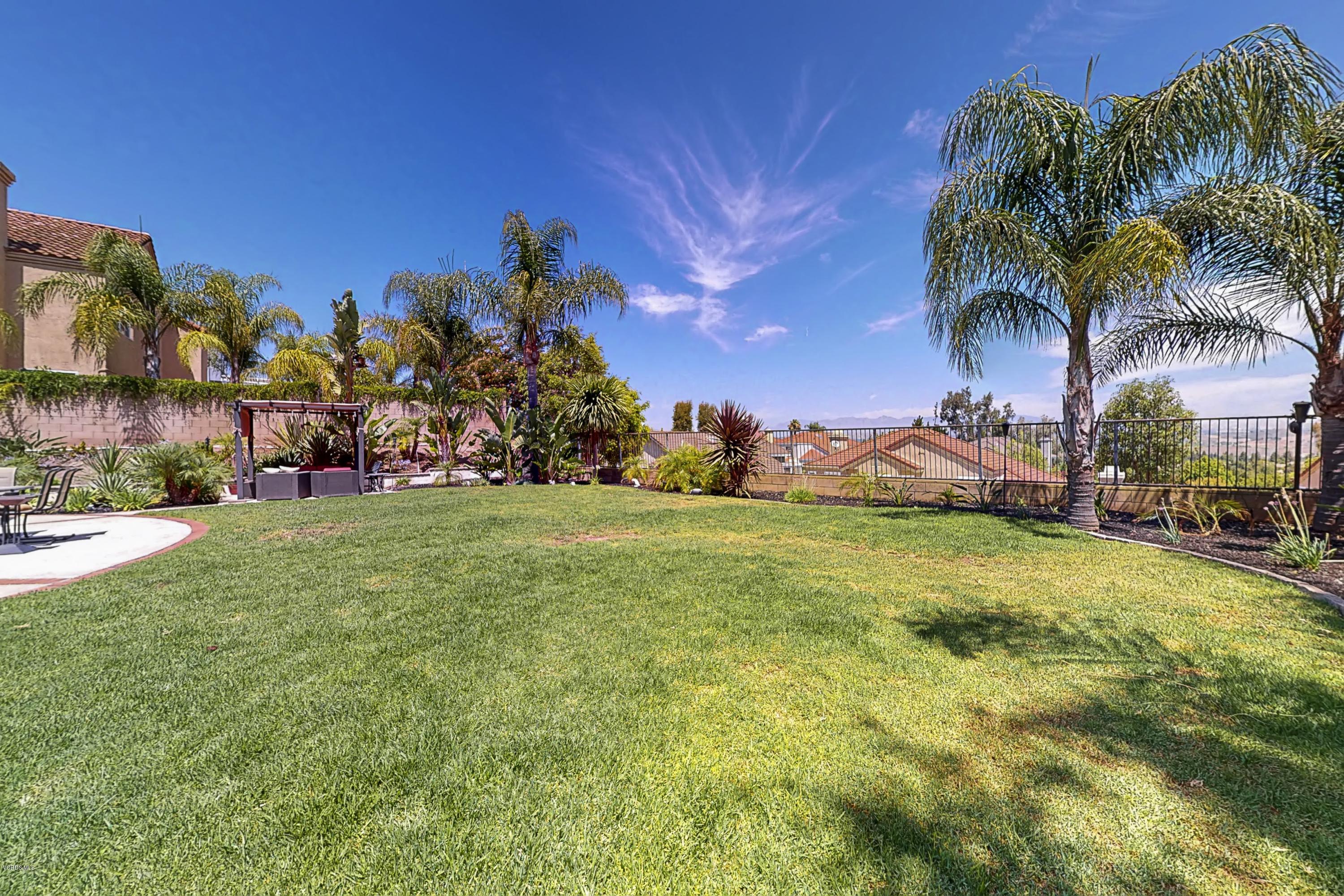 11577 Chestnut Ridge Street Moorpark, CA 93021 - Photo 55 of 58 a view of a yard with a house