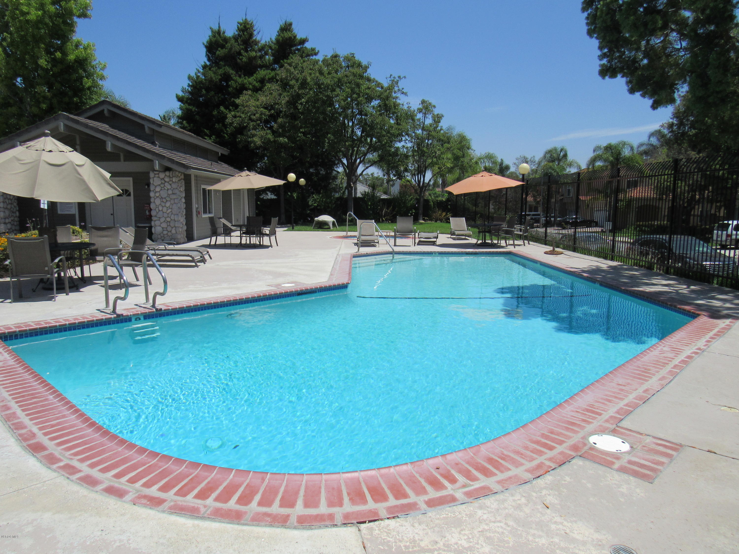 11577 Chestnut Ridge Street Moorpark, CA 93021 - Photo 56 of 58 a view of swimming pool with outdoor seating