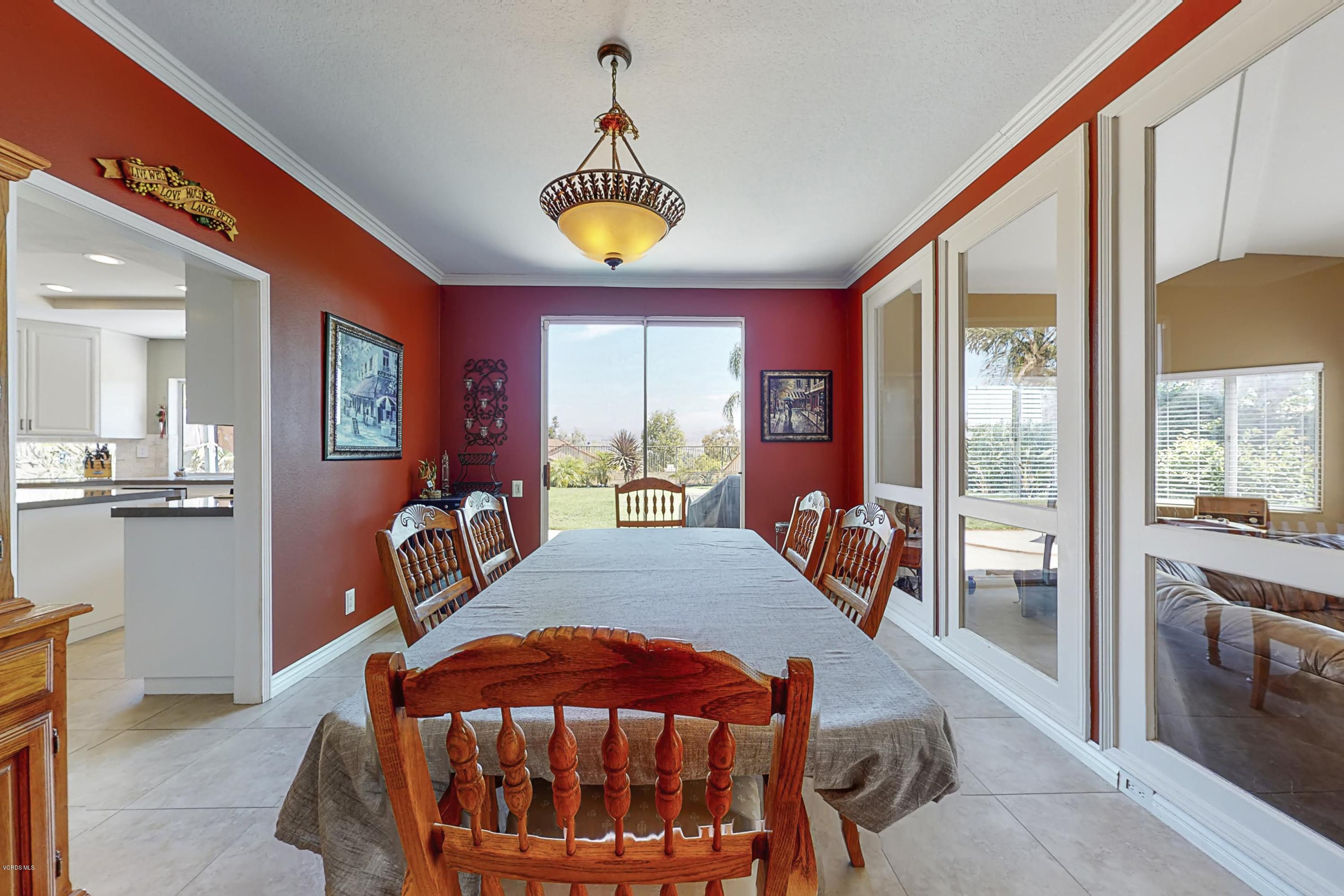 11577 Chestnut Ridge Street Moorpark, CA 93021 - Photo 9 of 58 a view of a dining room with furniture window and wooden floor