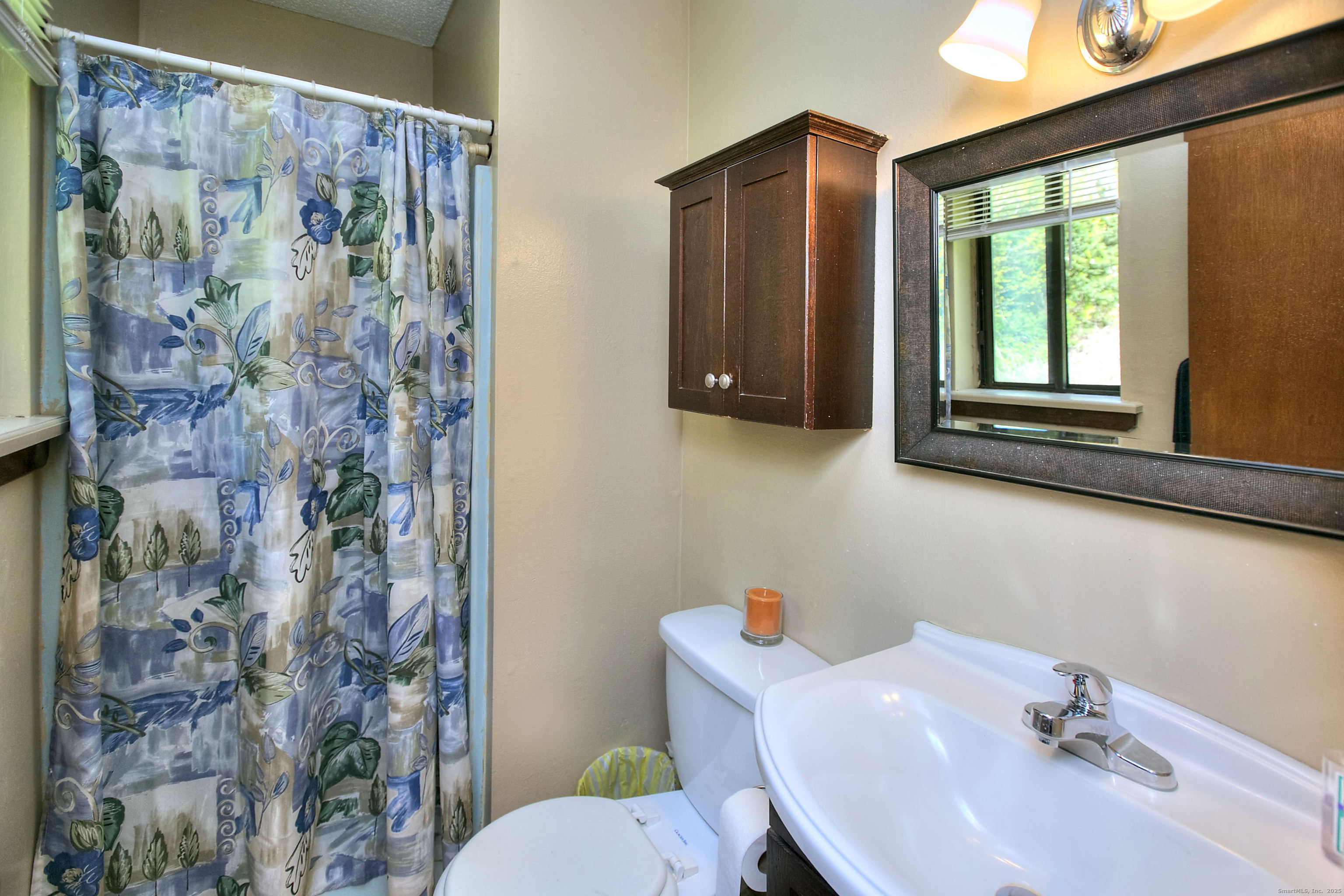 223 River Road Shelton, CT 06484 - Photo 4 of 11 a bathroom with a sink toilet and shower