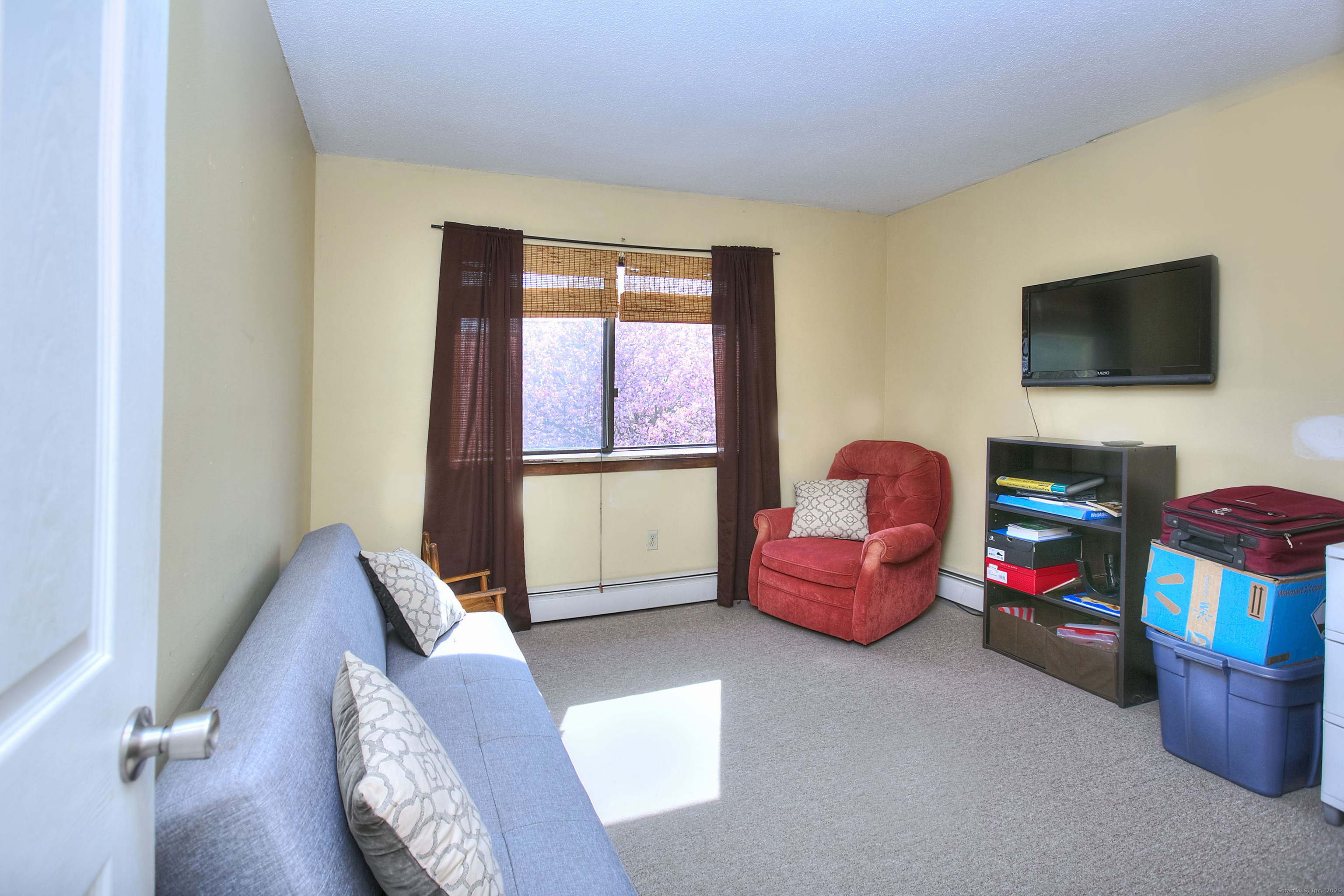 223 River Road Shelton, CT 06484 - Photo 5 of 11 a living room with furniture toys and a flat screen tv