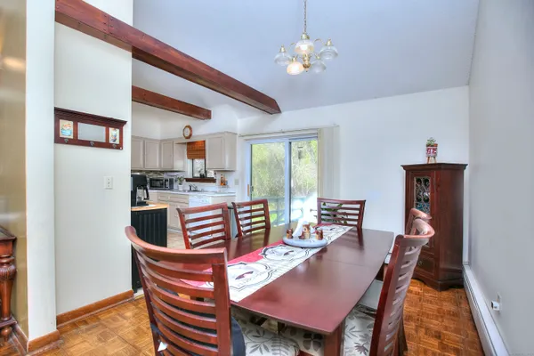 a view of a dining room with furniture