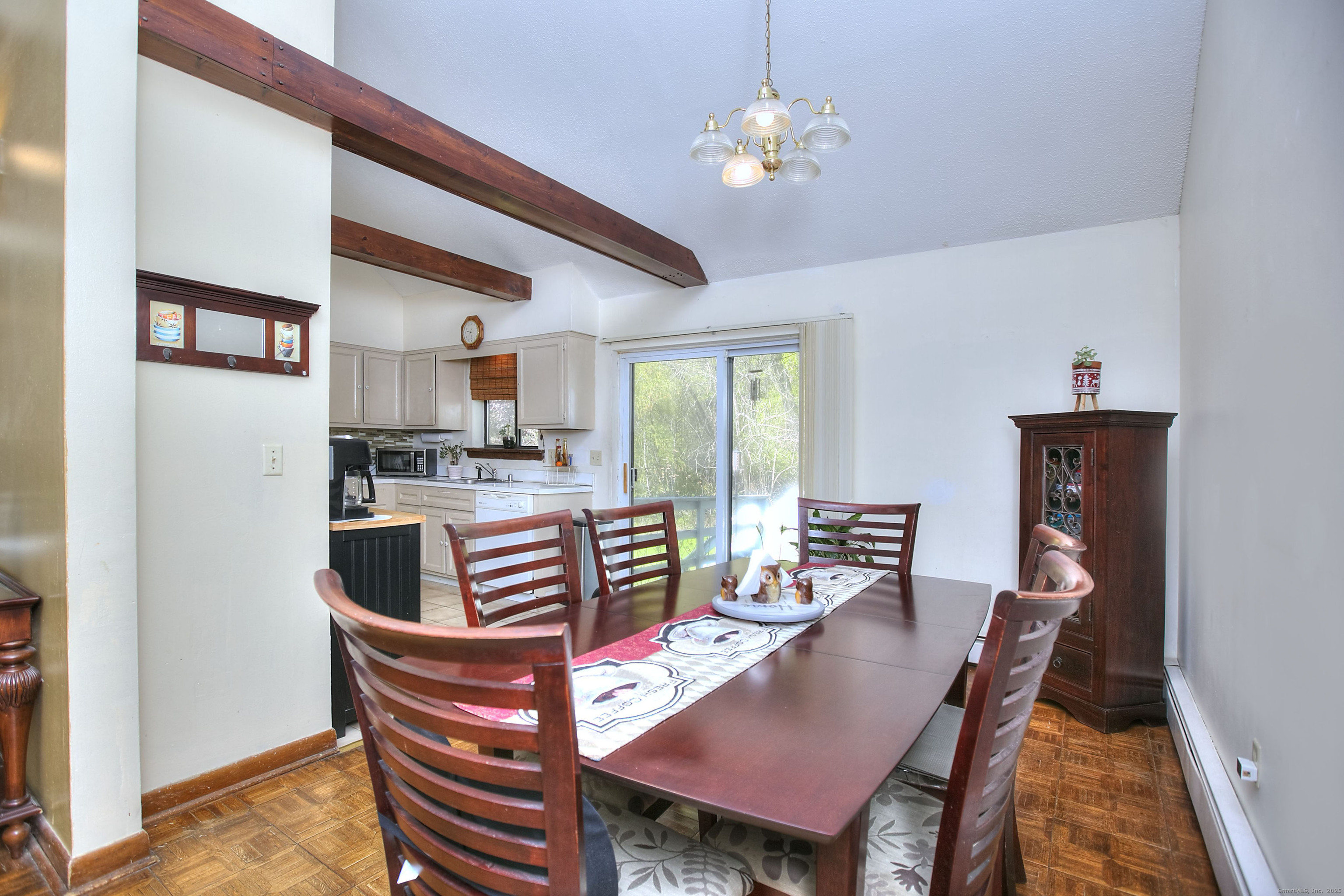223 River Road Shelton, CT 06484 - Photo 8 of 11 a view of a dining room with furniture