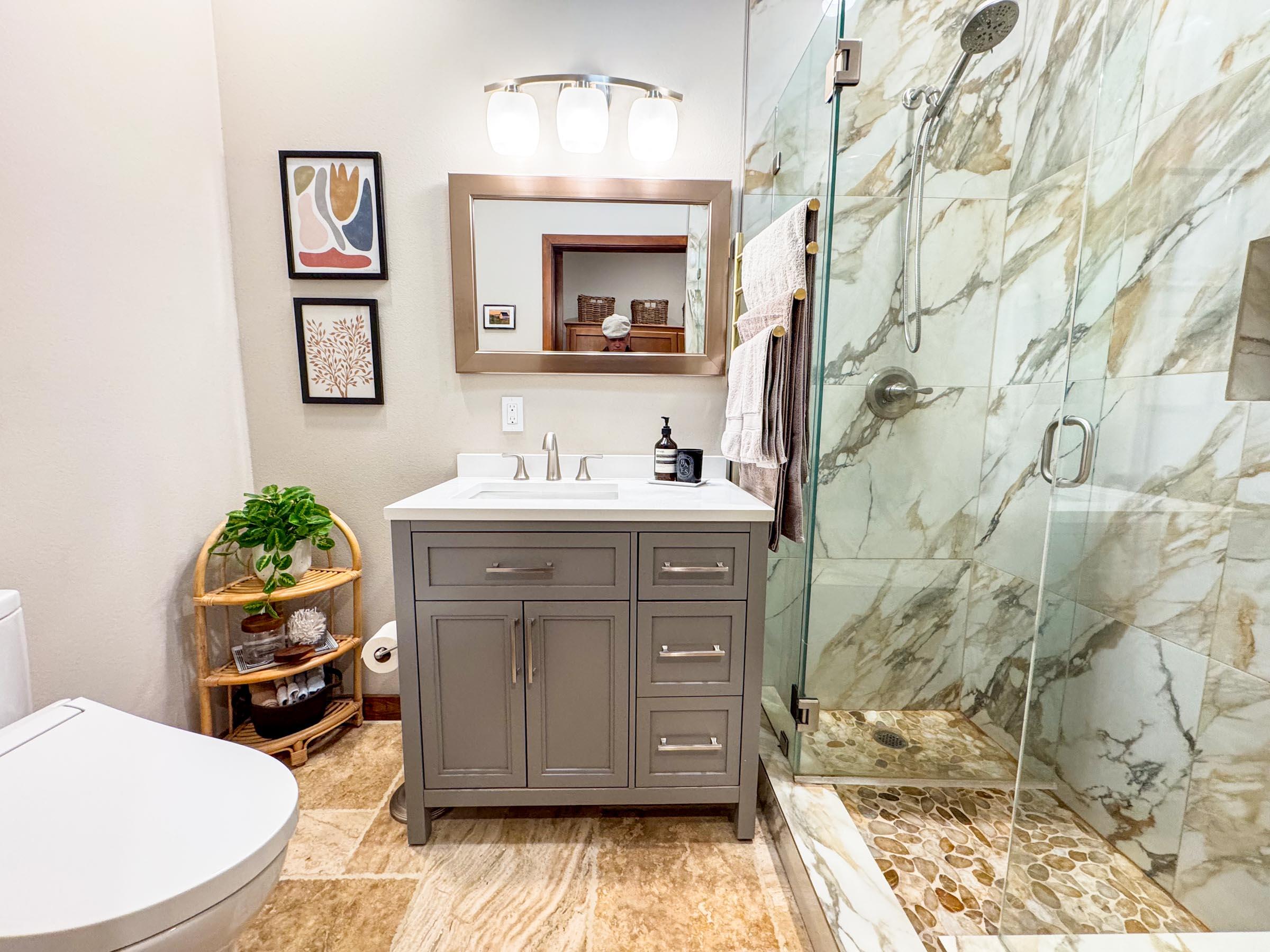 80394 Ave 48, Unit 156 Indio, CA 92201 - Photo 37 of 42 a bathroom with a sink mirror and vanity