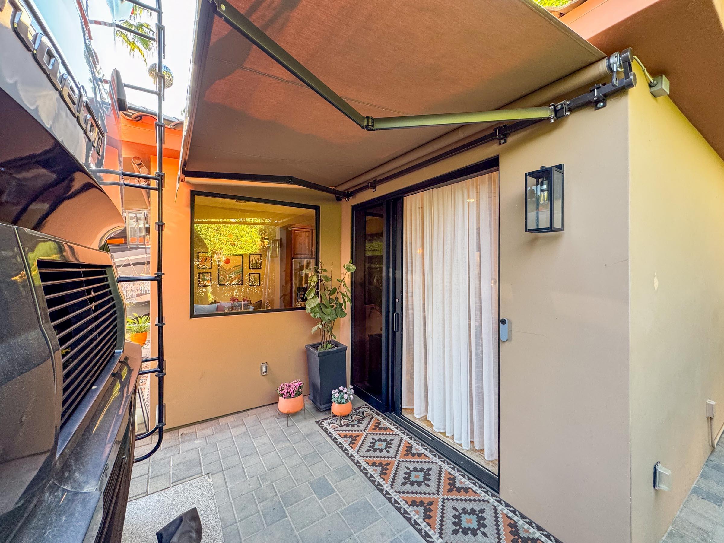 80394 Ave 48, Unit 156 Indio, CA 92201 - Photo 41 of 42 a view of a door with a glass door