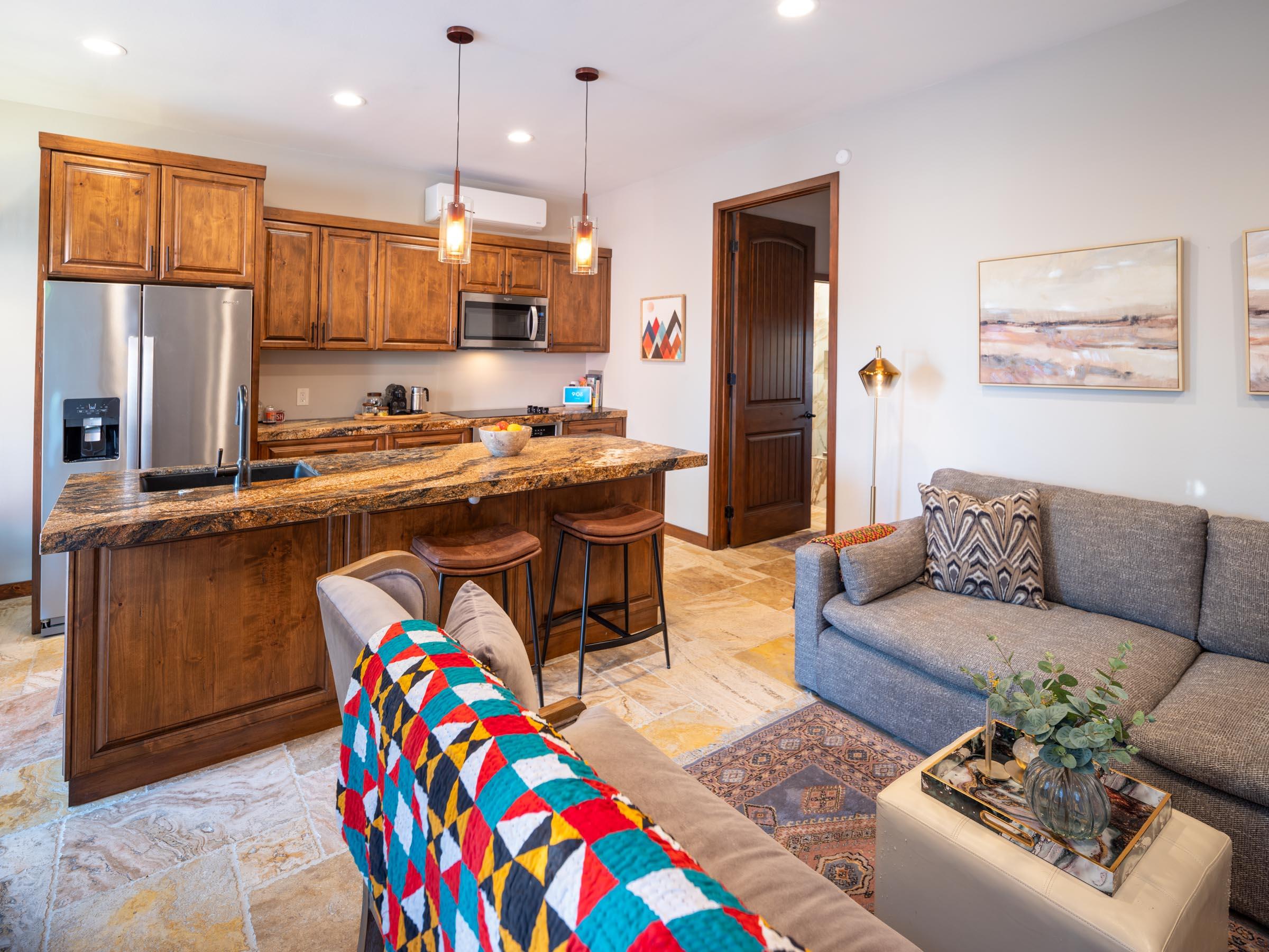 80394 Ave 48, Unit 156 Indio, CA 92201 - Photo 42 of 42 a living room with stainless steel appliances furniture and a kitchen view