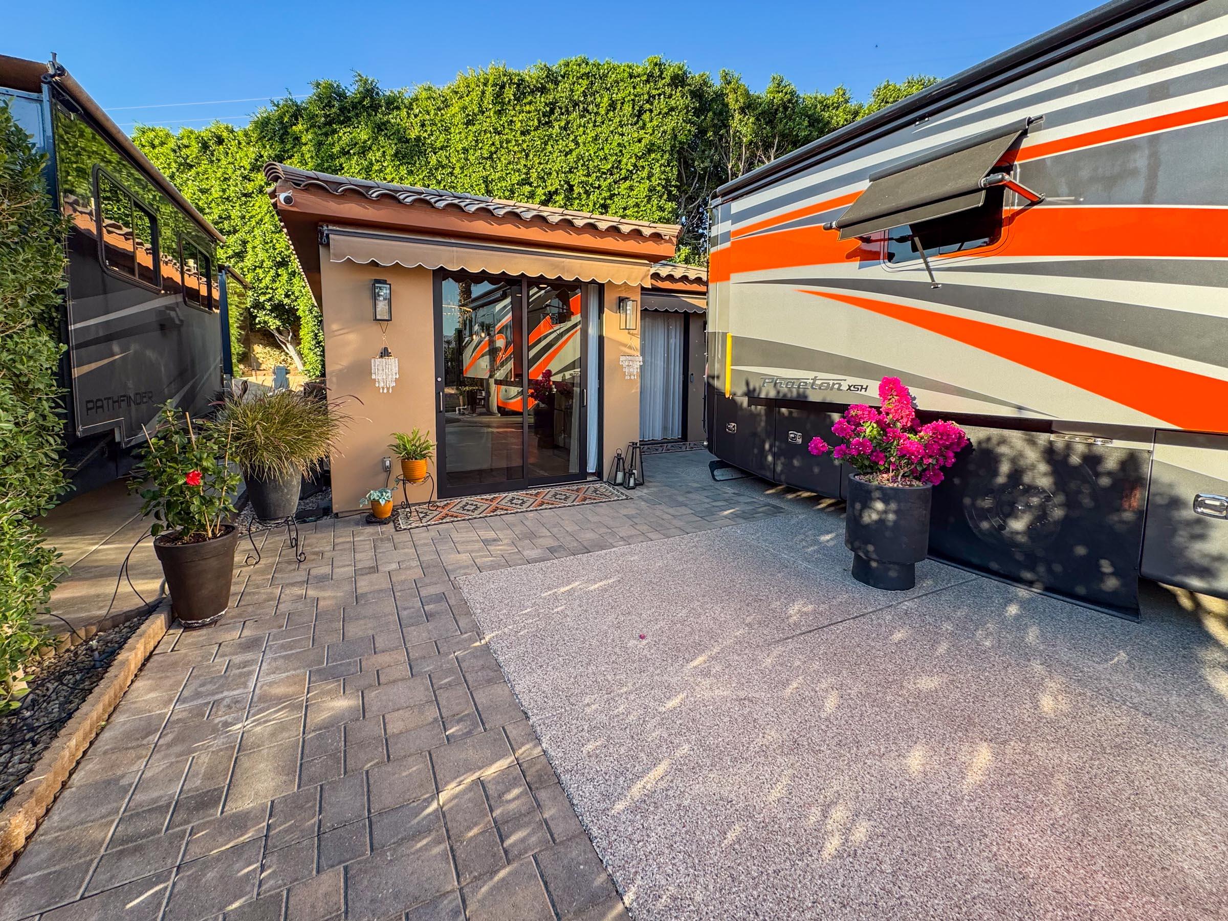80394 Ave 48, Unit 156 Indio, CA 92201 - Photo 9 of 42 a view of a garage with cars