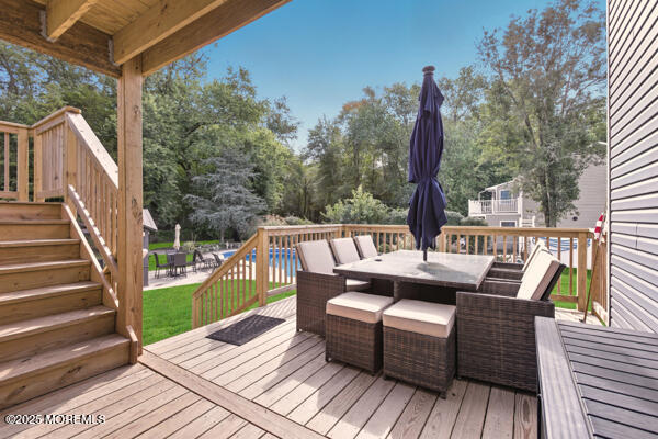 83 Whitesville Road Jackson, NJ 08527 - Photo 23 of 38 a view of a patio on the roof deck