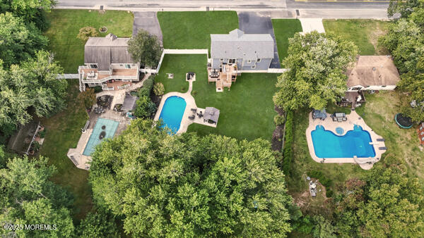 83 Whitesville Road Jackson, NJ 08527 - Photo 35 of 38 an aerial view of a house with outdoor space swimming pool and mountains