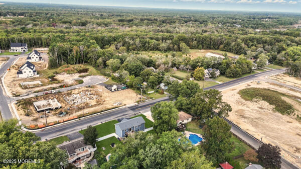 83 Whitesville Road Jackson, NJ 08527 - Photo 37 of 38 an aerial view of a house with a yard