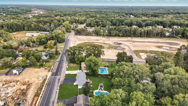 83 Whitesville Road Jackson, NJ 08527 - Photo 38 of 38 an aerial view of a houses with a yard and lake view