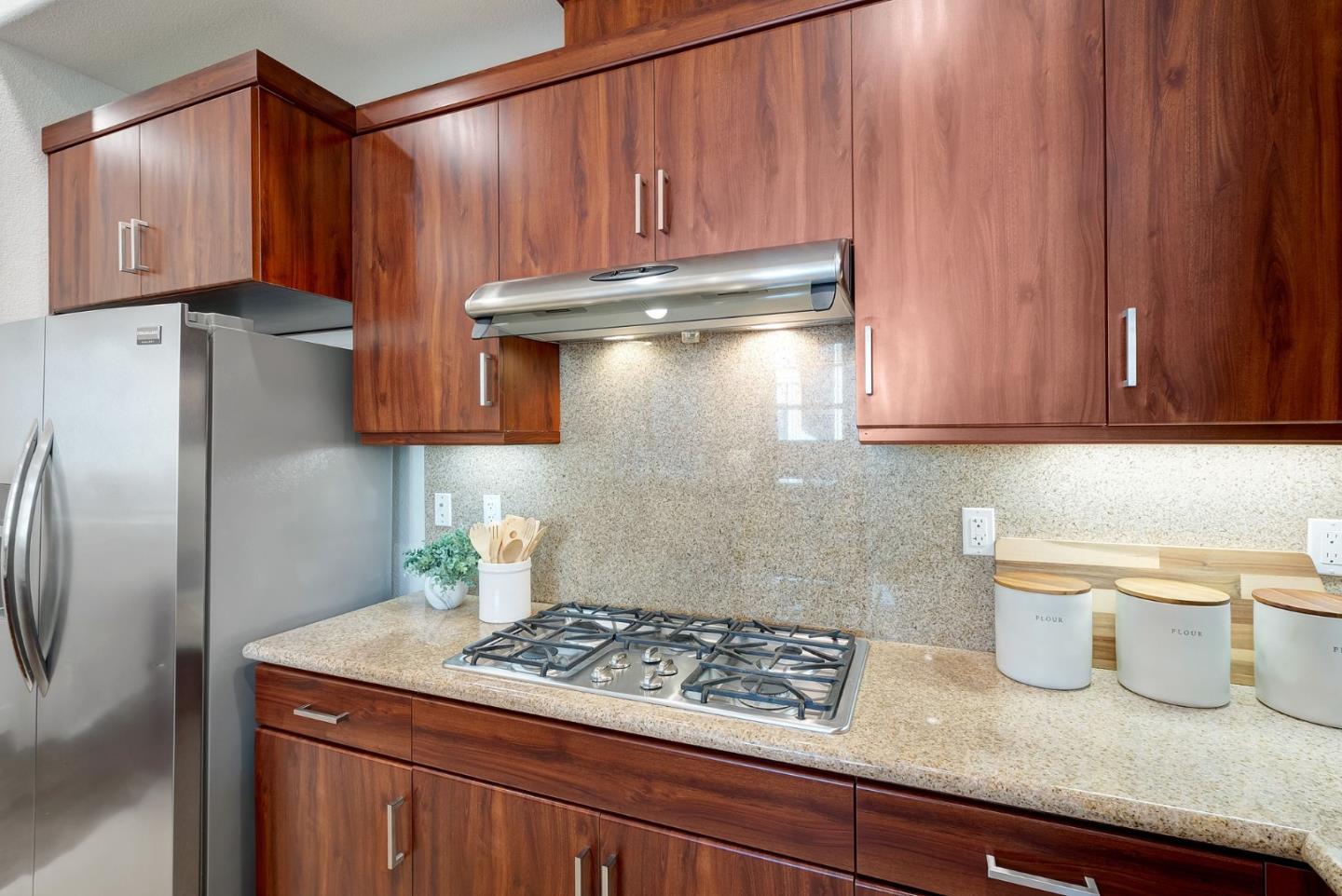 4248 Rickeys Way, Unit S Palo Alto, CA 94306 - Photo 16 of 42 a kitchen with stainless steel appliances granite countertop a sink stove and refrigerator