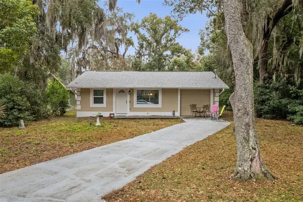 front view of a house and a yard