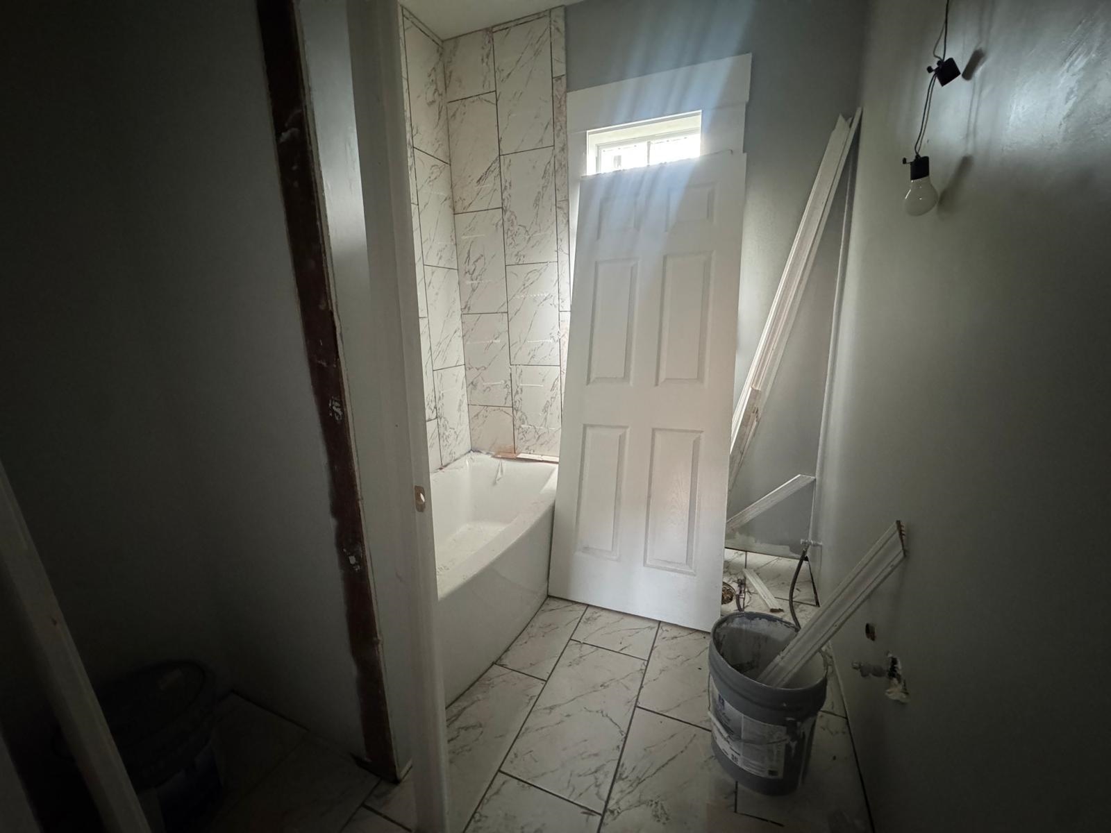 1134 Decatur Street Memphis, TN 38107 - Photo 12 of 12 a bathroom with a bathtub and toilet