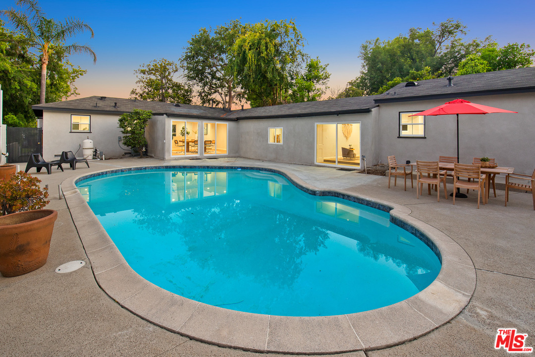 2377 Galbreth Road Pasadena, CA 91104 - Photo 22 of 22 a view of a swimming pool with chairs