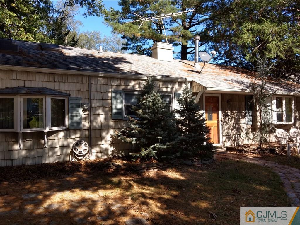 5 Dayton Road Edison, NJ 08817 - Photo 1 of 3 a view of a house with a tree
